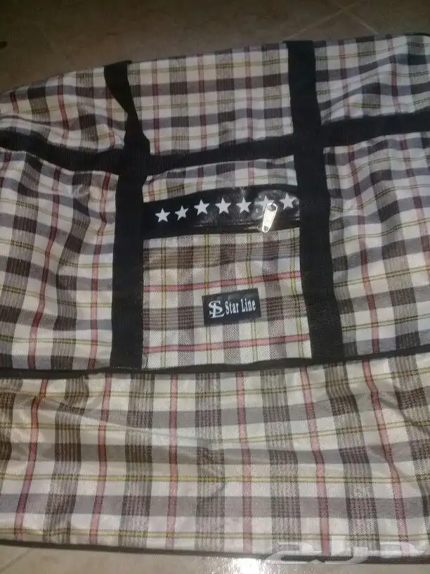 شنطة او كيس سفر قوي بعجلات يحمل 30 كيلو وفوق 1