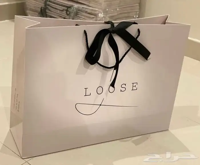 ليبل نسيج ليبل طباعة لوقو جلد أكياس ملونة بوكسات عبايات لوق 63