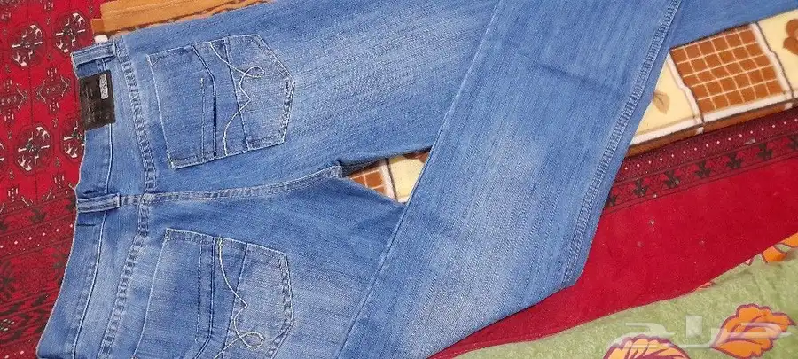 بنطلون جينز ازرق سماوي بحري جديد لم يستخدم مقاس 30 32 السعر 100 ريال 6