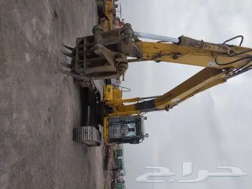 بوكلين للايجار لتحميل وتنزيل الحديد السكراب والخردة 2