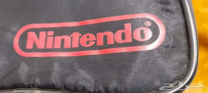 شنطه يد ماركة Nintendo سمراء جديده 2