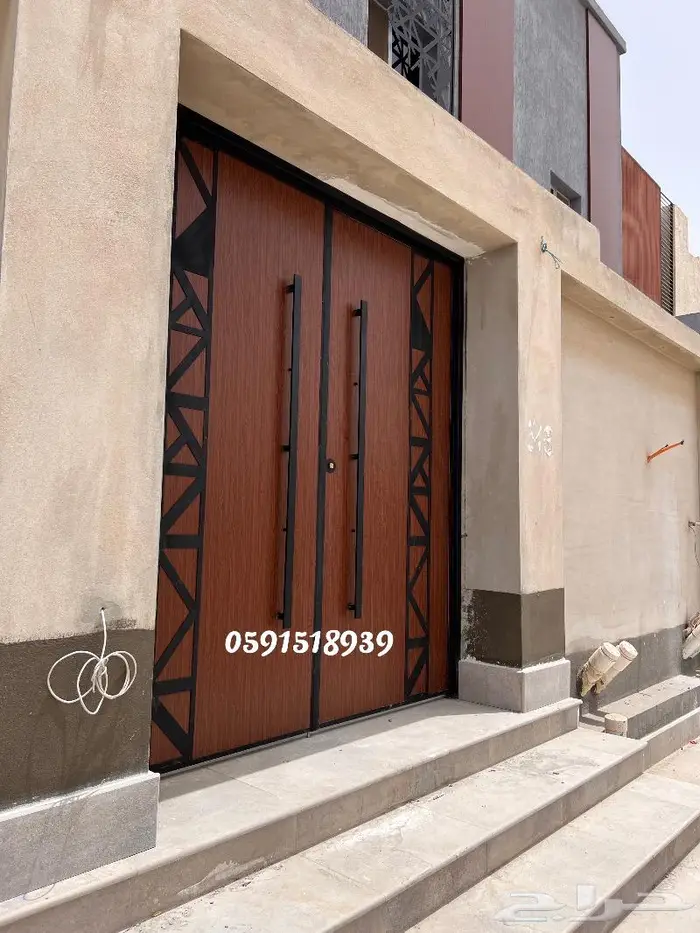 ابواب حديد - درابزينات - ابواب كلادينج- ابواب ليزر 8
