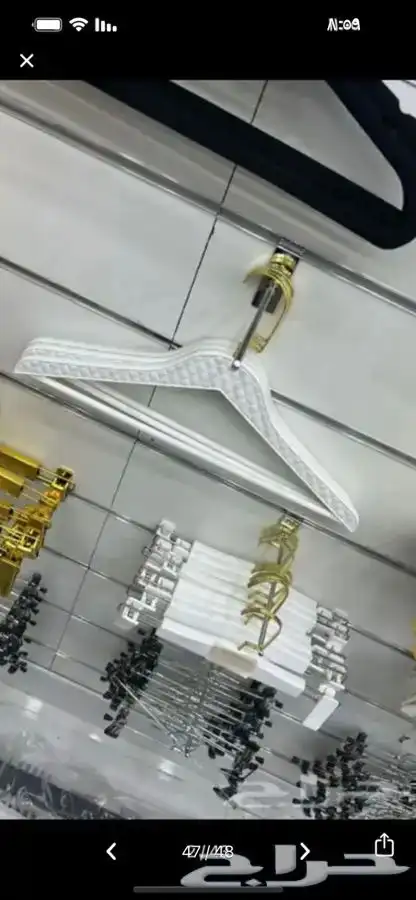 علاقات ملابس بلاستك. مساك تنوره مساك بنطلون 1