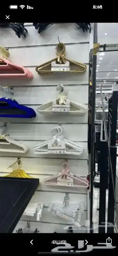 علاقات ملابس بلاستك. مساك تنوره مساك بنطلون 4