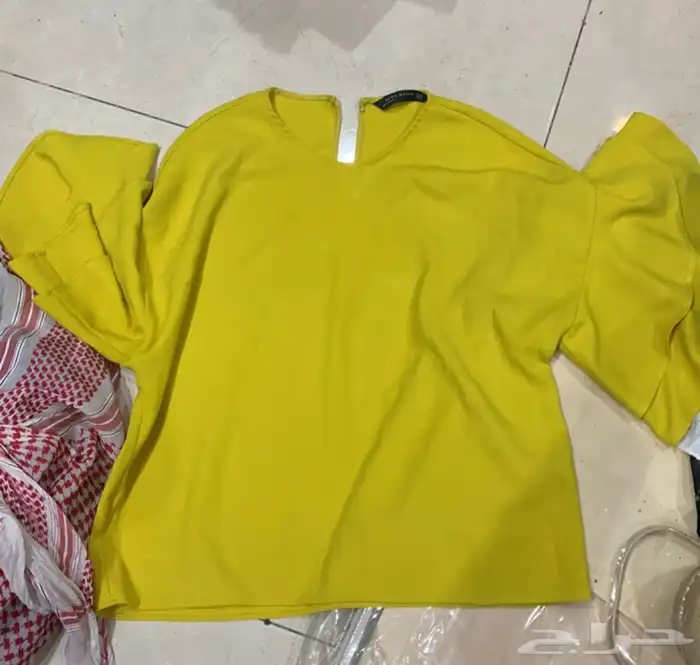 بلايز نسائية مشكلة 50