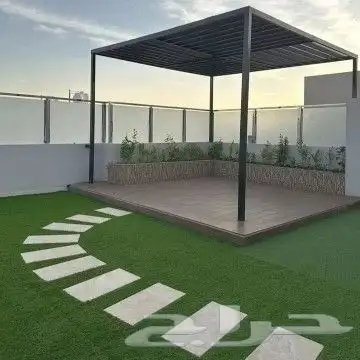 عشب_صناعي تنسيق حدائق زراعة شلالات نوافير مظلات جداري شبكات 6