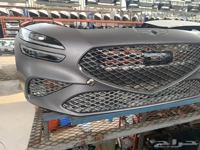 صدام وشمعات جنسس G70 1