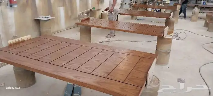 متخصصون في صناعة الابواب و طاولات المجالس والطعام 18