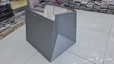 أكياس ملونة بوكسات عبايات ليبل قماش لوقو ورق تغليف ستكر كرت 22