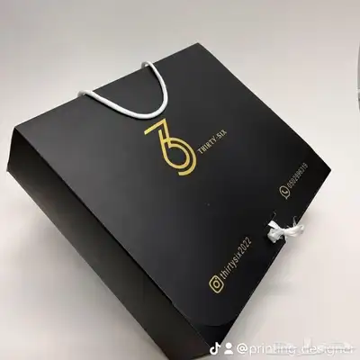 أكياس ملونة بوكسات عبايات ليبل قماش لوقو ورق تغليف ستكر كرت 89