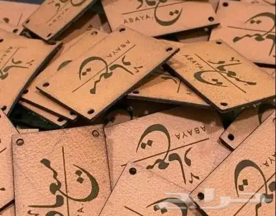 تنفيذ لوقو تاق اكريليك خشب وجلد 11