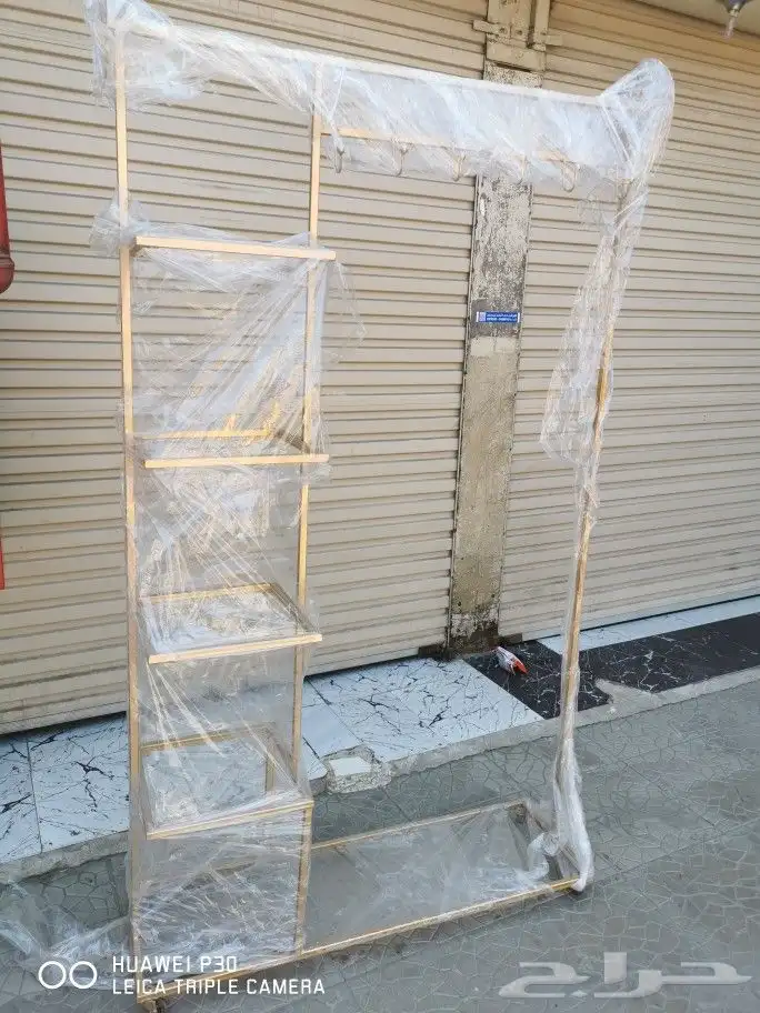 علاقه ملابس حديد 23