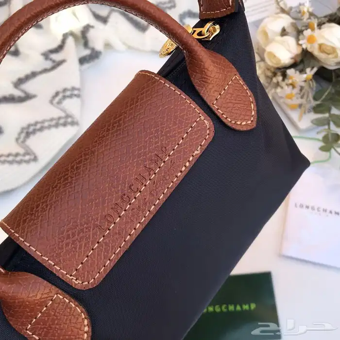 سكارفات 150 ريال وشنط درجه اولى 94