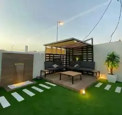 عشب_صناعي تنسيق حدائق زراعة شلالات نوافير مظلات جداري شبكات 29