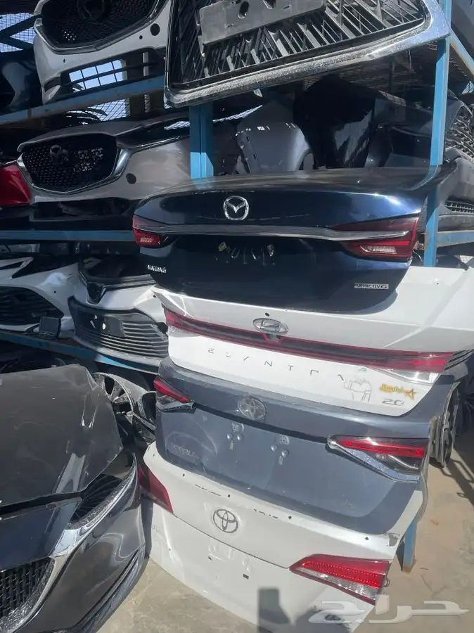 قطع غيار مازدا بجميع انواعه شمعات صدامات ابواب رفارف 1