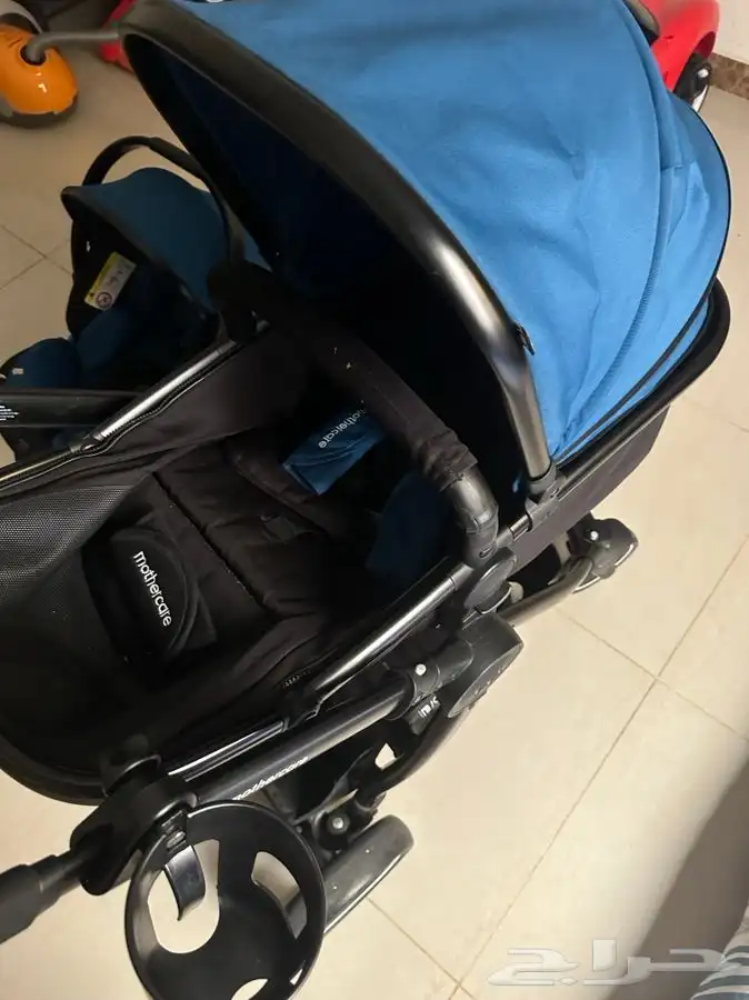 عربية اطفال مع كرسي سيارة trolley 1