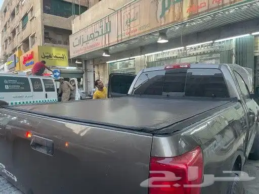 شراع السياره وغطا السياره في مسامير التثبيت وفي قبضات 4