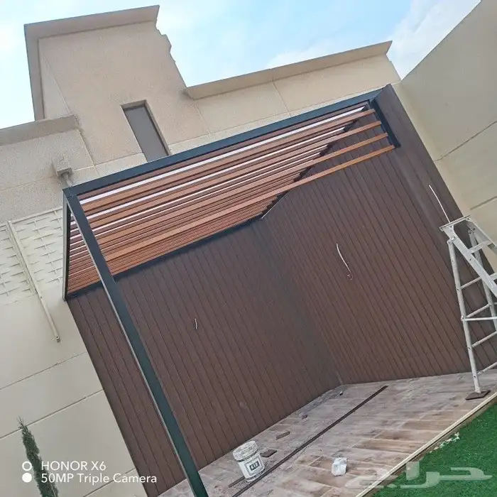 أعمال حداده مظلات جلسات برجولات تركيب بديل الخشب عشب صناعي 0