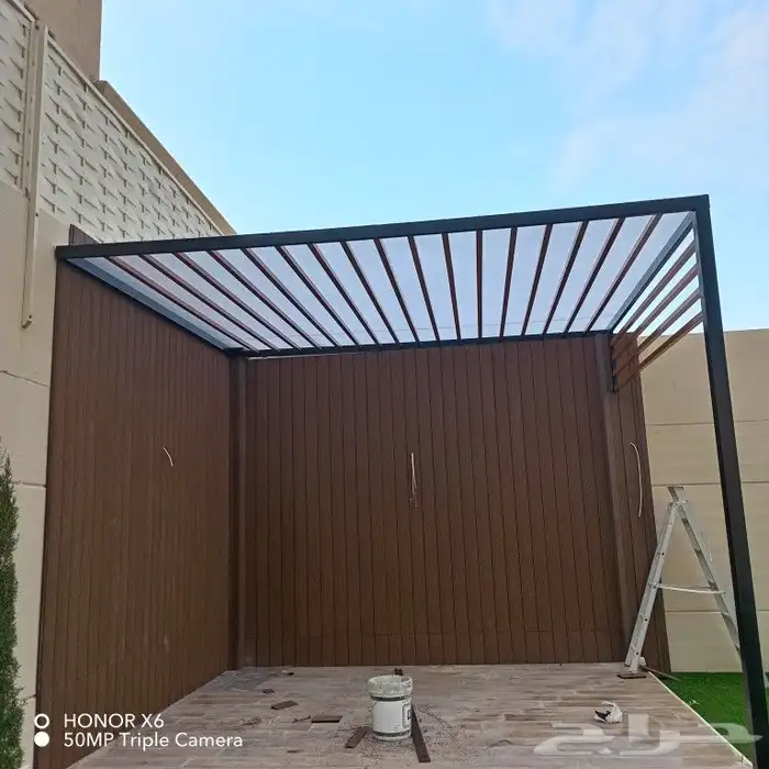 أعمال حداده مظلات جلسات برجولات تركيب بديل الخشب عشب صناعي 2