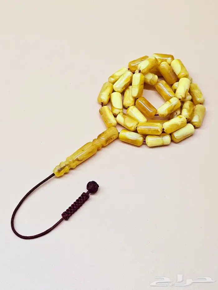 مسباح تراب كهرمان بكركوشة قماش 1