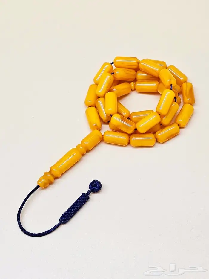 مسباح تراب كهرمان بكركوشة قماش 0