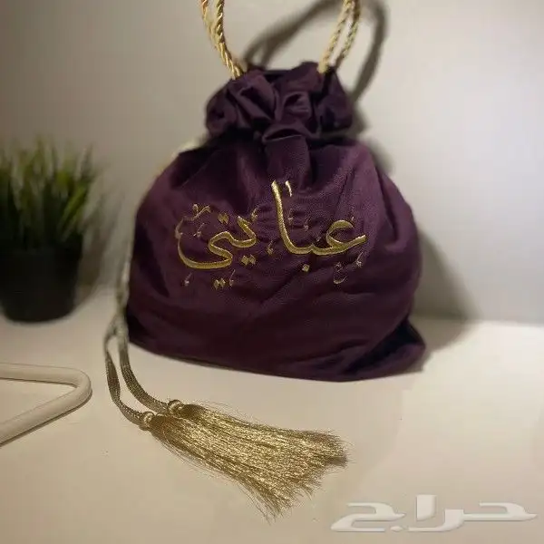 شنط باوتش و تيشرتات 0