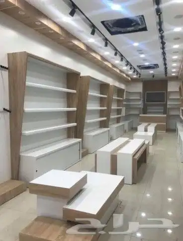 محلات ديكورات خشاب محل جوالات محل كوفي شوب تفصيل أو تصميم 3
