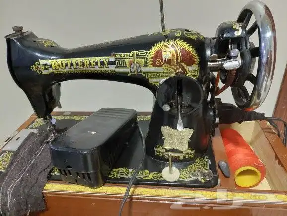 مكينة خياطة أصلية 2