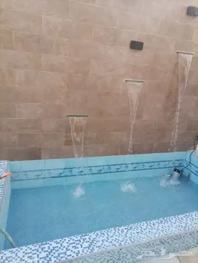 تنسيق حدائق وشلالات 7