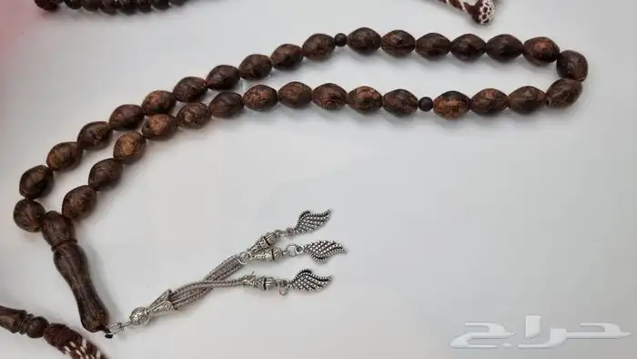 سبح قرفة يسر فضه كهرمان عقيق 20