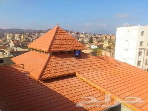 تنفيذ وتوريد جميع أنواع القرميد والعوزال ملون وعادي قرميد سع 0