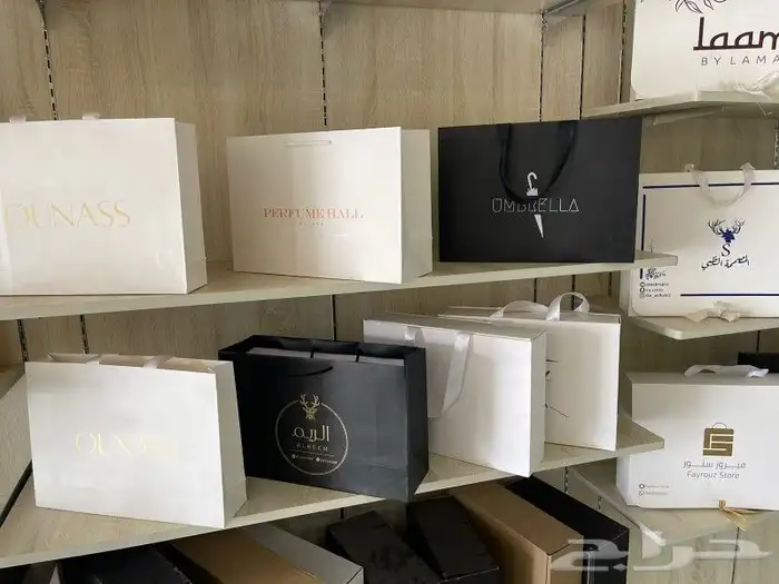طباعه لوقو عبايات تاق ليبل قماش اكياس عبايه بوكسات ملابس كرت 5