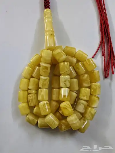 سبحة كهرب طبيعي مبرقع بياض قطع صندوقي 0
