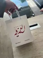 طباعه بوكسات شاورما حلويات اكياس منيو لوقو قماش جلد شرايط 7