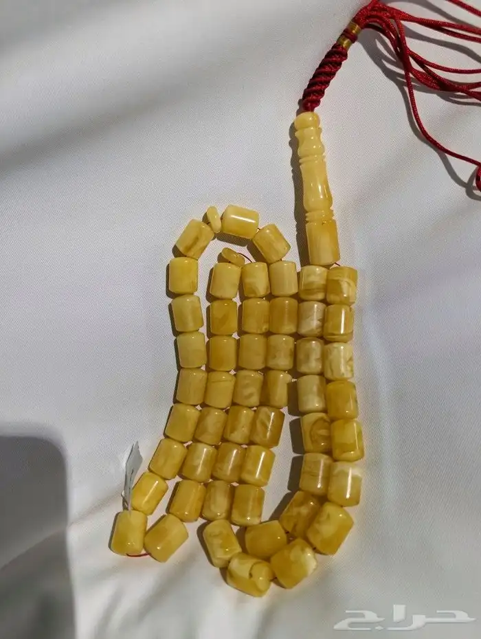 سبحة كهرب طبيعي مبرقع بياض قطع صندوقي 1