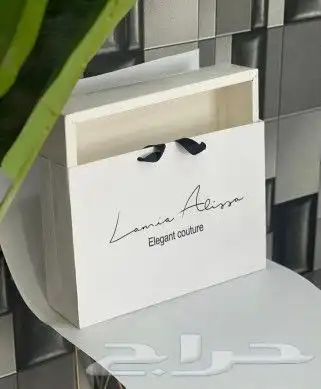 طباعه ليبل قماش لوقو عبايه بوكسات عبايات اكياس ورق تغيلف 6