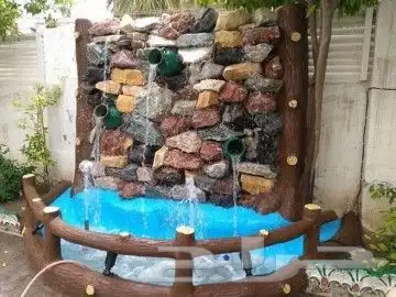 منسق حدائق معلم حجر معلم ديكورات معلم شلالات ونوافير 0