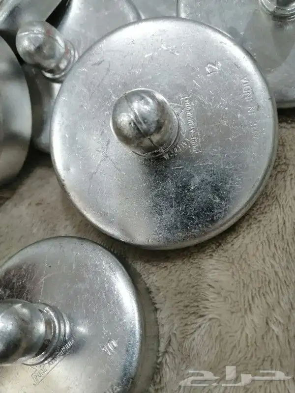 مغارف معدن و أغطية اباريق معدن ختم واحد و فناجيل 5