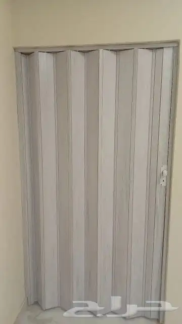 تركيب باب سحب كرديون . تركيب باب جلد . تركيب أبواب حديد 4