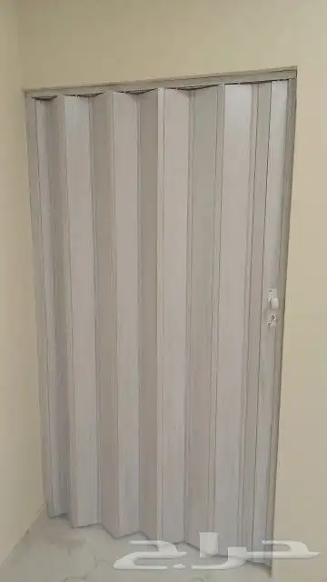 تركيب باب سحب كرديون . تركيب باب جلد . تركيب أبواب حديد 6