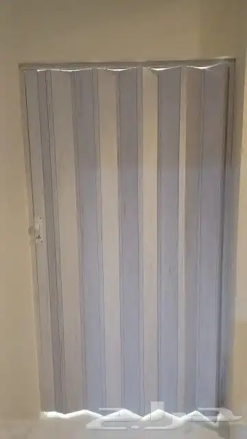 تركيب باب سحب كرديون . تركيب باب جلد . تركيب أبواب حديد 1