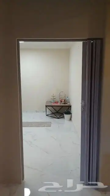 تركيب باب سحب كرديون . تركيب باب جلد . تركيب أبواب حديد 7