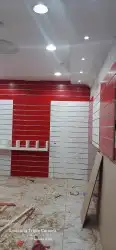 نجار ...تجهيز محلا ت تجاريه ..وجميع اعمال الديكور ات.اسقف قو 7