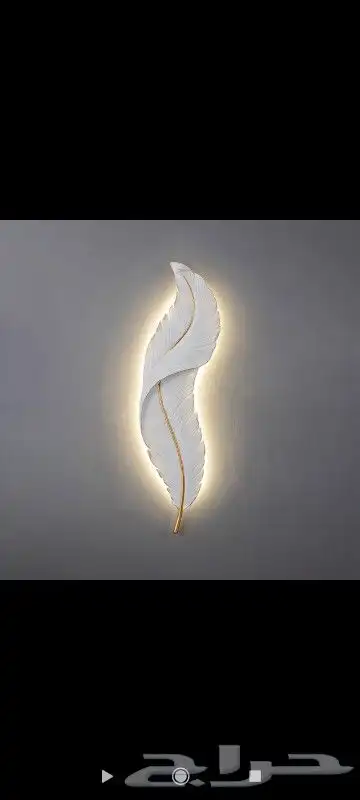 ابجوره جدارية على شكل ريشه تعمل بالبطاريه 1