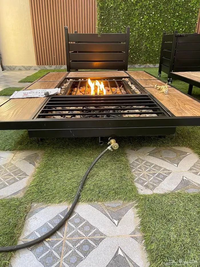 طاولات حدائق تدفئة ومنقد غاز وحطب 70