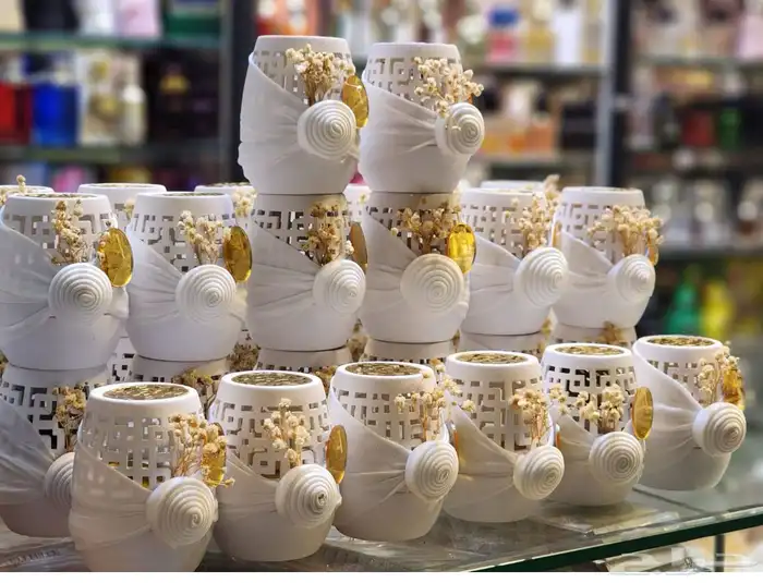 توزيعات رمضان العيد التخرج مواليد عطور ميني بالدرزن جمله 12