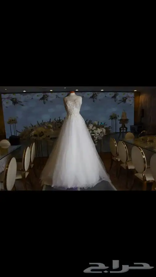 فستان زفاف مصنوع من قماش أسباني مع طرحة طويلة بمشبك 0