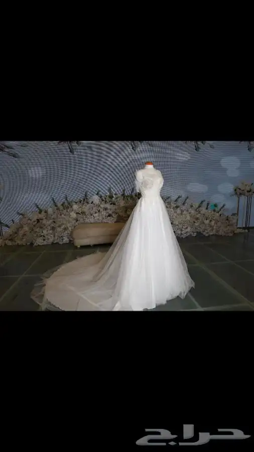 فستان زفاف مصنوع من قماش أسباني مع طرحة طويلة بمشبك 1