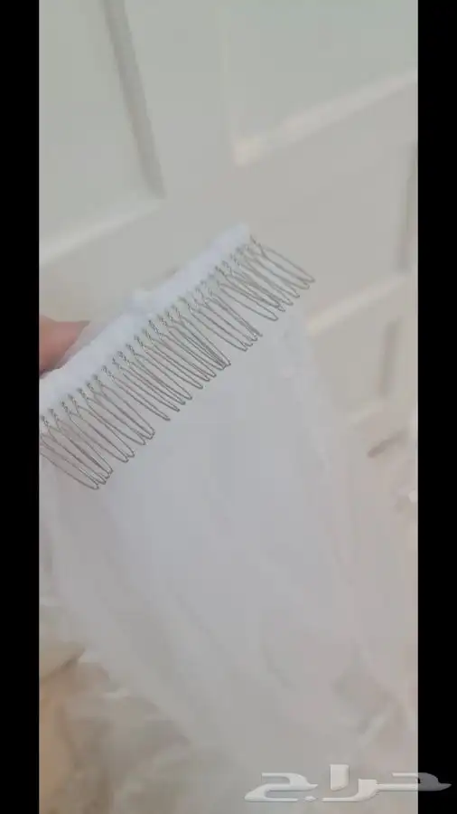 فستان زفاف مصنوع من قماش أسباني مع طرحة طويلة بمشبك 6