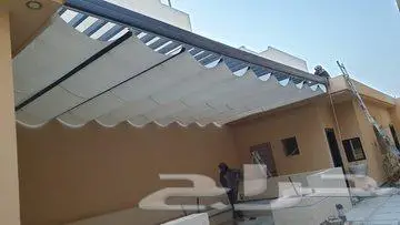 مظلات متحركة محلات بالريموت كهربائية او يدويا وسحب 8